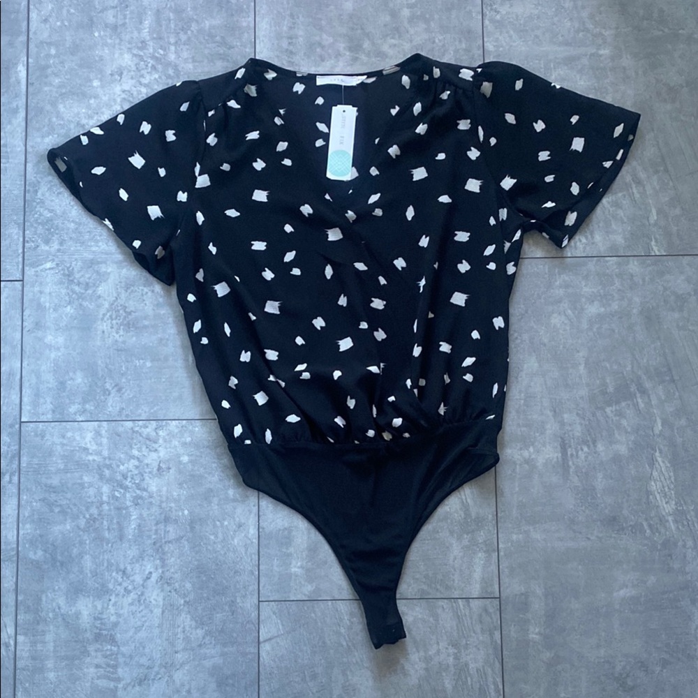 Lush Black and White Patterned Bodysuit